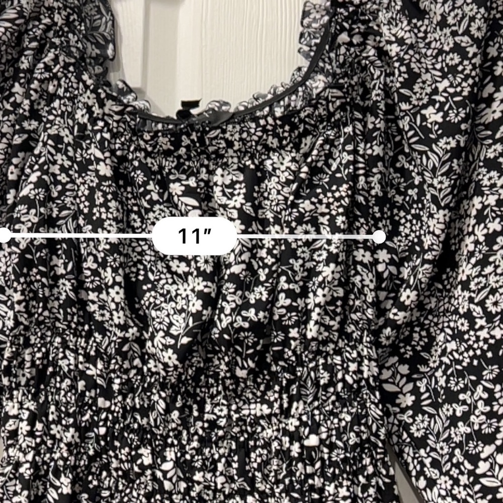 Black and white flowery dress with teeny tiny bits of red, fit and flare